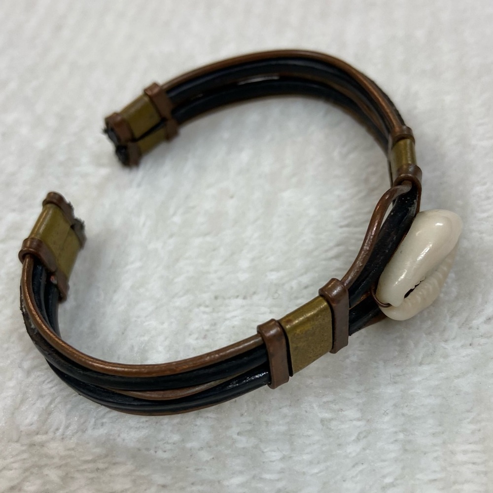 Brass, Leather, and a Shell Bracelet